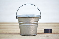small silver metal bucket