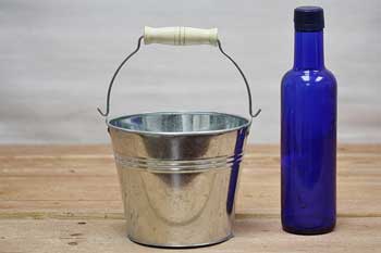small tin bucket with wood handle